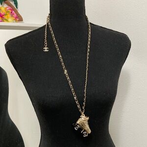 CHANEL Gold Necklace with Skating Shoe Pendant